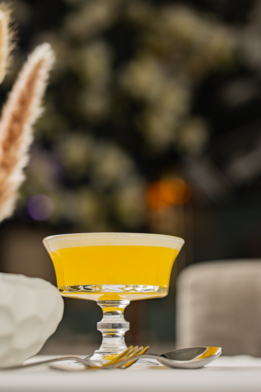 Yellow Limoncello digestif in the evening at the bar of Casa Bellucci on the Kudamm
